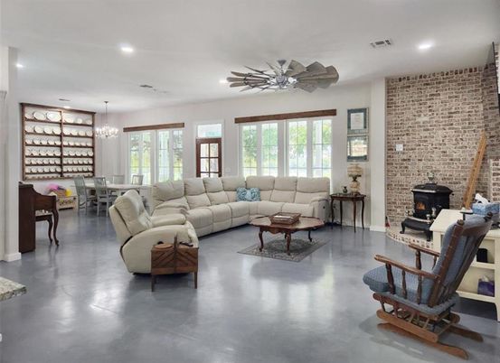 Chandelier, Dining room, Fireplace, Interior, Living room, Recessed Lighting, Stone Walls
