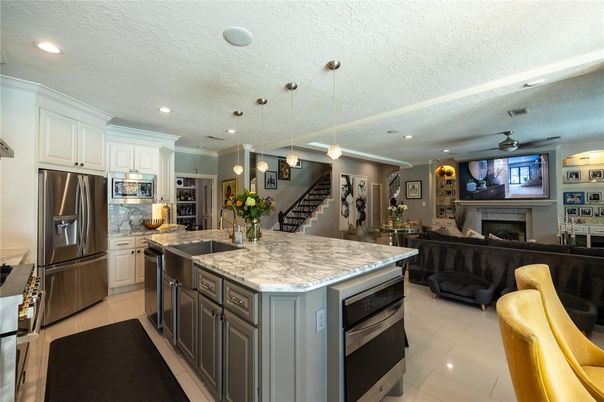 Fireplace, Interior, Kitchen, Living room, Pendant Lights, Recessed Lighting, Stainless Steel Appliances