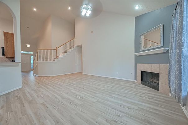 Fireplace, Interior, Pendant Lights, Recessed Lighting, Wood Texture Flooring
