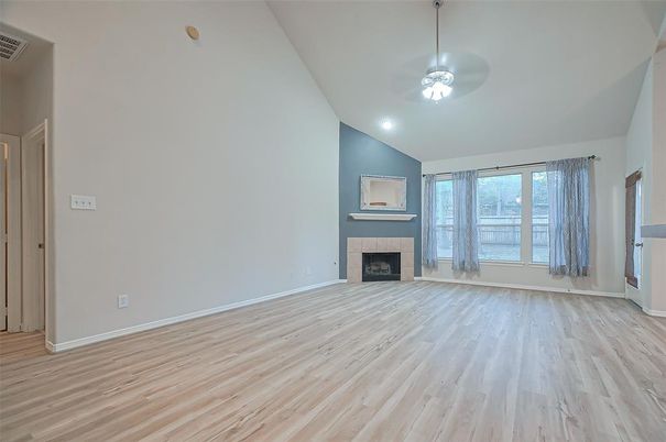 Empty room, Fireplace, Interior, Pendant Lights, Recessed Lighting, Wood Texture Flooring