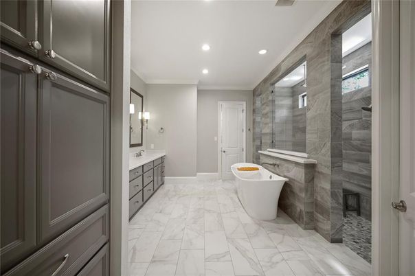 Bathroom, Dual Sink Vanities, Free Standing Baths, Glass Shower, Interior, Marble, Marble Walls, Recessed Lighting