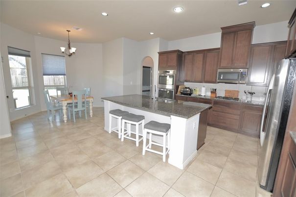 Chandelier, Dining room, Interior, Kitchen, Recessed Lighting, Stainless Steel Appliances