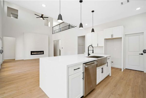 Fireplace, Interior, Kitchen, Pendant Lights, Recessed Lighting, Stainless Steel Appliances, Wood Texture Flooring