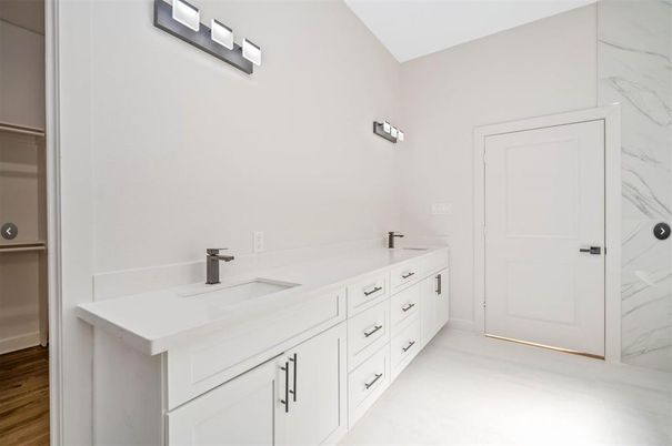 Bathroom, Dual Sink Vanities, Interior, Marble Walls, Wood Texture Flooring