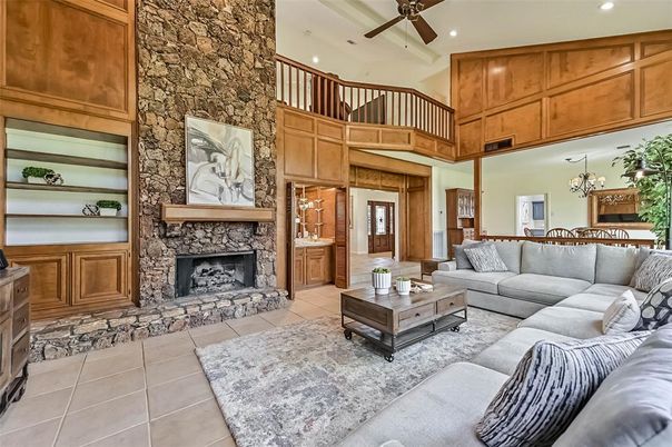 Chandelier, Fireplace, Interior, Living room, Recessed Lighting, Stone Walls