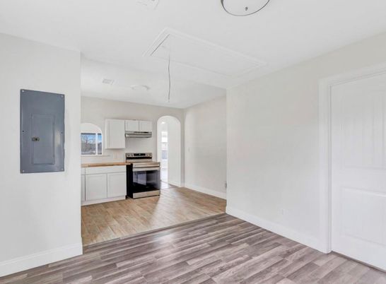 Empty room, Interior, Kitchen, Stainless Steel Appliances, Wood Texture Flooring