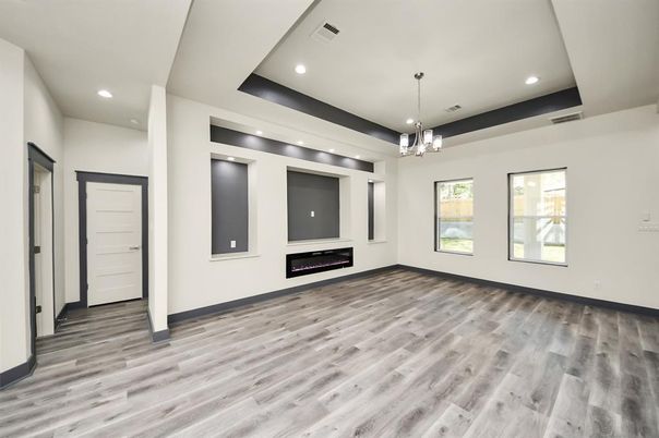 Empty room, Fireplace, Interior, Pendant Lights, Recessed Lighting, Wood Texture Flooring