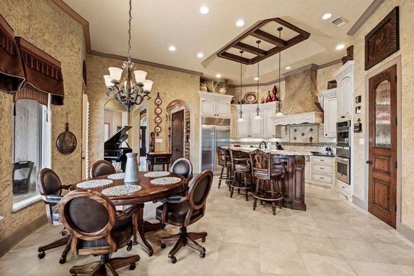 Chandelier, Dining room, Interior, Kitchen, Pendant Lights, Piano, Recessed Lighting, Stainless Steel Appliances