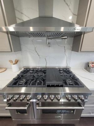 Interior, Kitchen, Marble Walls, Stainless Steel Appliances