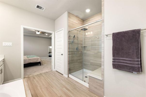 Bathroom, Bedroom, Glass Shower, Interior, Recessed Lighting, Wood Texture Flooring