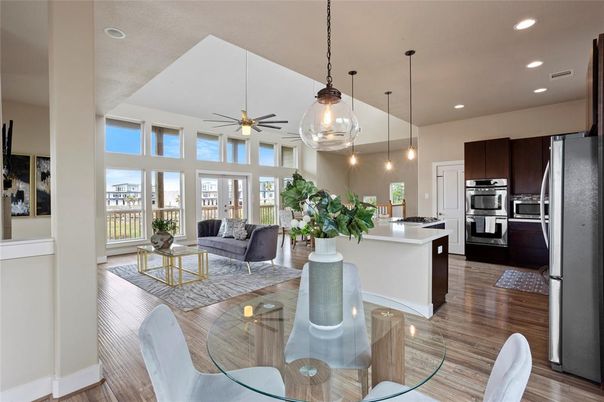 Dining room, Interior, Kitchen, Living room, Pendant Lights, Recessed Lighting, Stainless Steel Appliances, Wood Texture Flooring