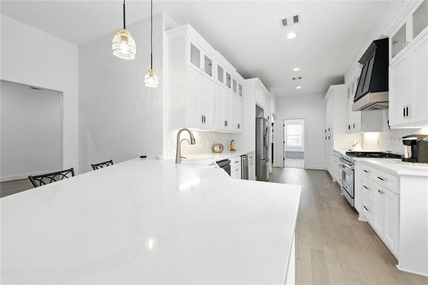 Interior, Kitchen, Pendant Lights, Recessed Lighting, Stainless Steel Appliances, Wood Texture Flooring