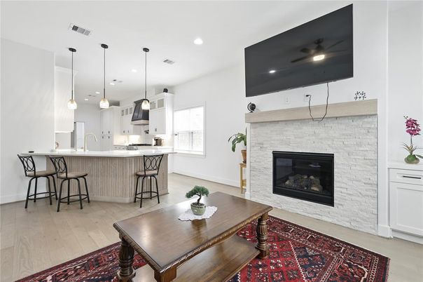 Fireplace, Interior, Kitchen, Pendant Lights, Recessed Lighting, Stone Walls, Wood Texture Flooring