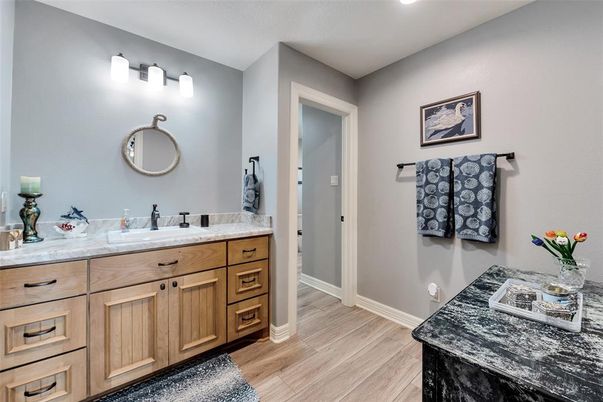 Bathroom, Dual Sink Vanities, Interior, Recessed Lighting, Wood Texture Flooring