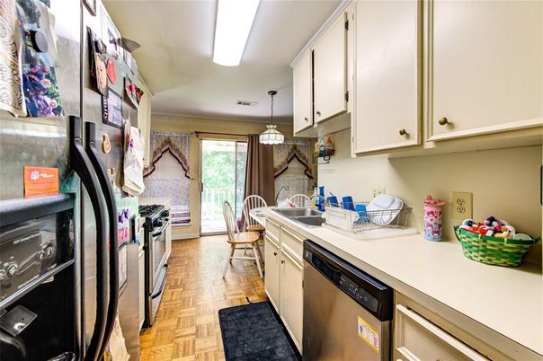 Dining room, Interior, Kitchen, Pendant Lights, Stainless Steel Appliances, Wood Texture Flooring