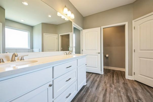 Bathroom, Dual Sink Vanities, Interior, Recessed Lighting, Wood Texture Flooring