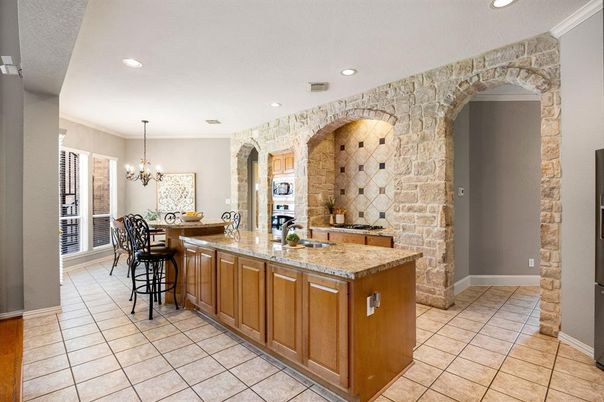 Chandelier, Dining room, Interior, Kitchen, Recessed Lighting, Stainless Steel Appliances, Stone Walls