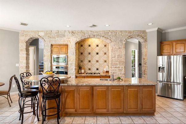 Interior, Kitchen, Recessed Lighting, Stainless Steel Appliances, Stone Walls