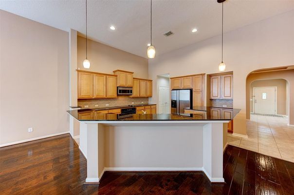 Interior, Kitchen, Pendant Lights, Recessed Lighting, Stainless Steel Appliances, Wood Texture Flooring