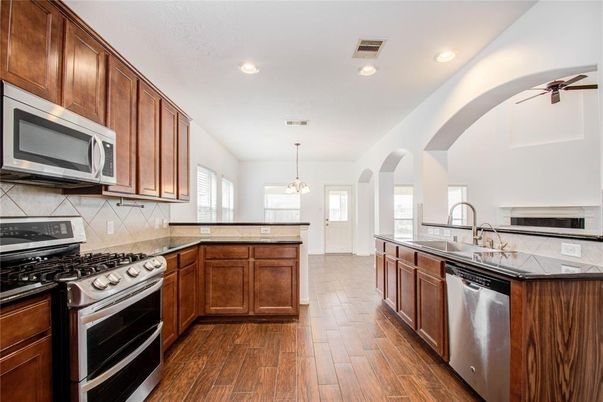 Interior, Kitchen, Pendant Lights, Recessed Lighting, Stainless Steel Appliances, Wood Texture Flooring