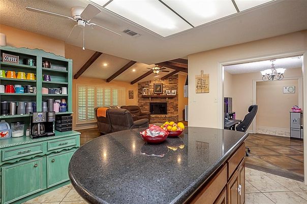 Chandelier, Dining room, Fireplace, Interior, Recessed Lighting, Stone Walls, Wooden Beams