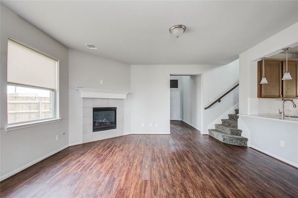 Empty room, Fireplace, Interior, Pendant Lights, Wood Texture Flooring