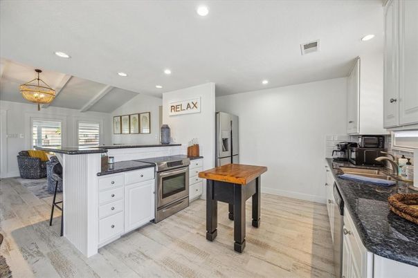 Interior, Kitchen, Pendant Lights, Recessed Lighting, Stainless Steel Appliances, Wood Texture Flooring