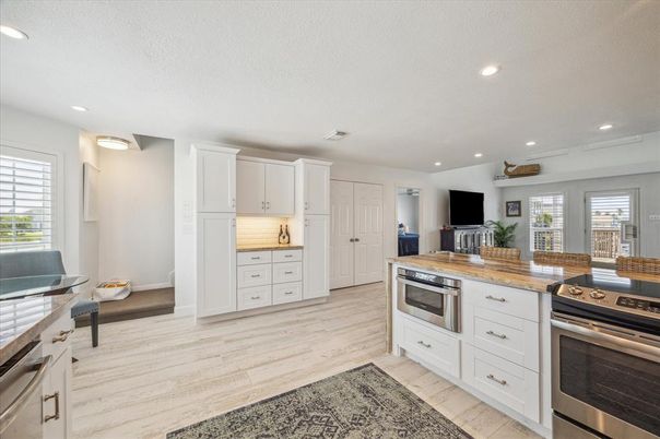 Interior, Kitchen, Recessed Lighting, Stainless Steel Appliances, Wood Texture Flooring