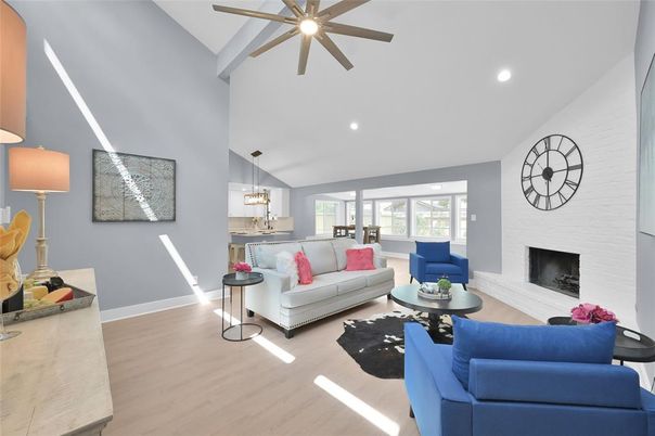 Chandelier, Dining room, Fireplace, Interior, Living room, Pendant Lights, Recessed Lighting, Wood Texture Flooring