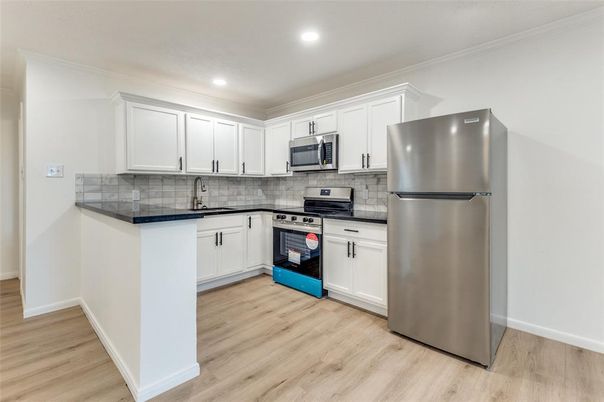 Interior, Kitchen, Recessed Lighting, Stainless Steel Appliances, Wood Texture Flooring