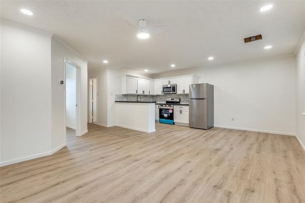Interior, Kitchen, Recessed Lighting, Stainless Steel Appliances, Wood Texture Flooring