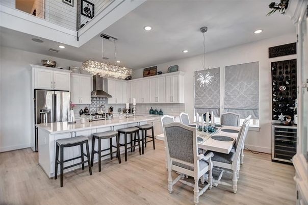 Chandelier, Dining room, Interior, Kitchen, Pendant Lights, Recessed Lighting, Stainless Steel Appliances, Wood Texture Flooring