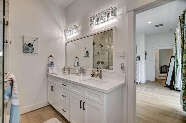 Bathroom, Dual Sink Vanities, Interior, Recessed Lighting, Wood Texture Flooring