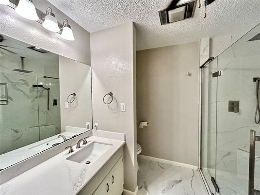 Bathroom, Dual Sink Vanities, Glass Shower, Interior, Marble, Marble Walls