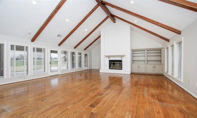 Empty room, Fireplace, Interior, Recessed Lighting, Wooden Beams, Wood Texture Flooring