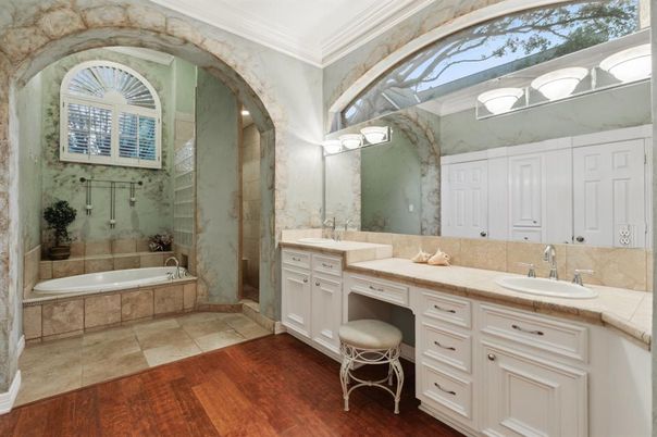 Bathroom, Dual Sink Vanities, Glass Shower, Interior, Tile Countertops, Wood Texture Flooring