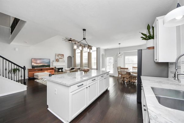 Dining room, Fireplace, Interior, Kitchen, Living room, Pendant Lights, Wood Texture Flooring
