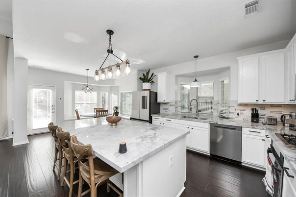 Dining room, Interior, Kitchen, Pendant Lights, Stainless Steel Appliances, Wood Texture Flooring