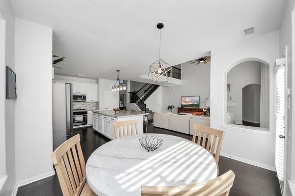 Dining room, Interior, Kitchen, Living room, Pendant Lights, Recessed Lighting, Stainless Steel Appliances, Wood Texture Flooring