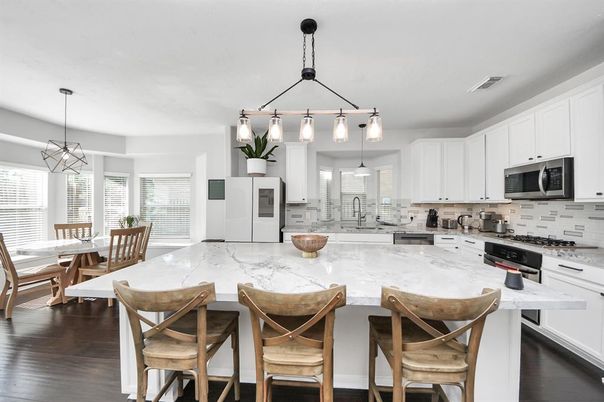 Dining room, Interior, Kitchen, Pendant Lights, Stainless Steel Appliances, Wood Texture Flooring