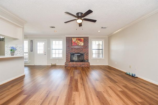 Empty room, Fireplace, Interior, Recessed Lighting, Stone Walls, Wood Texture Flooring