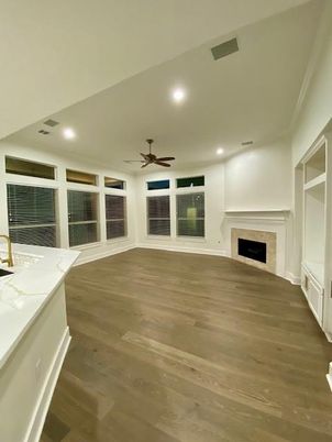 Empty room, Fireplace, Interior, Recessed Lighting, Wood Texture Flooring