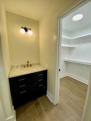 Bathroom, Interior, Recessed Lighting, Walk-in Closets, Wood Texture Flooring