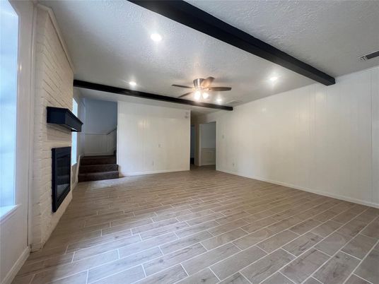 Empty room, Fireplace, Interior, Recessed Lighting, Wood Texture Flooring