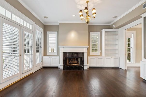 Chandelier, Empty room, Fireplace, Interior, Recessed Lighting, Wood Texture Flooring
