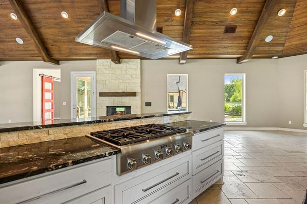Fireplace, Interior, Kitchen, Recessed Lighting, Stainless Steel Appliances, Stone Walls, Wooden Beams, Wooden Ceilings