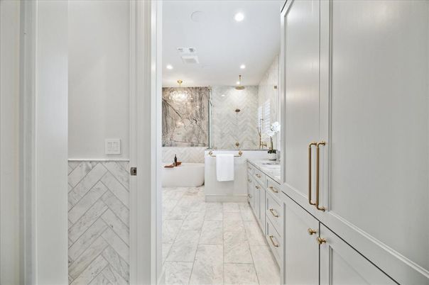 Bathroom, Dual Sink Vanities, Free Standing Baths, Interior, Marble, Marble Walls, Recessed Lighting
