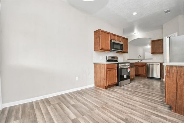 Interior, Kitchen, Recessed Lighting, Stainless Steel Appliances, Wood Texture Flooring