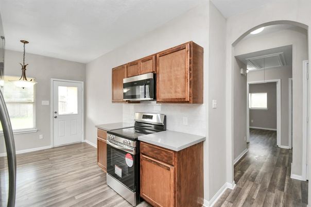 Interior, Kitchen, Pendant Lights, Stainless Steel Appliances, Wood Texture Flooring