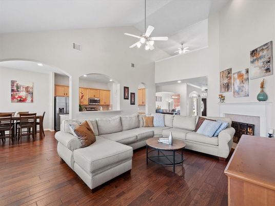 Dining room, Fireplace, Interior, Kitchen, Living room, Recessed Lighting, Stainless Steel Appliances, Wood Texture Flooring
